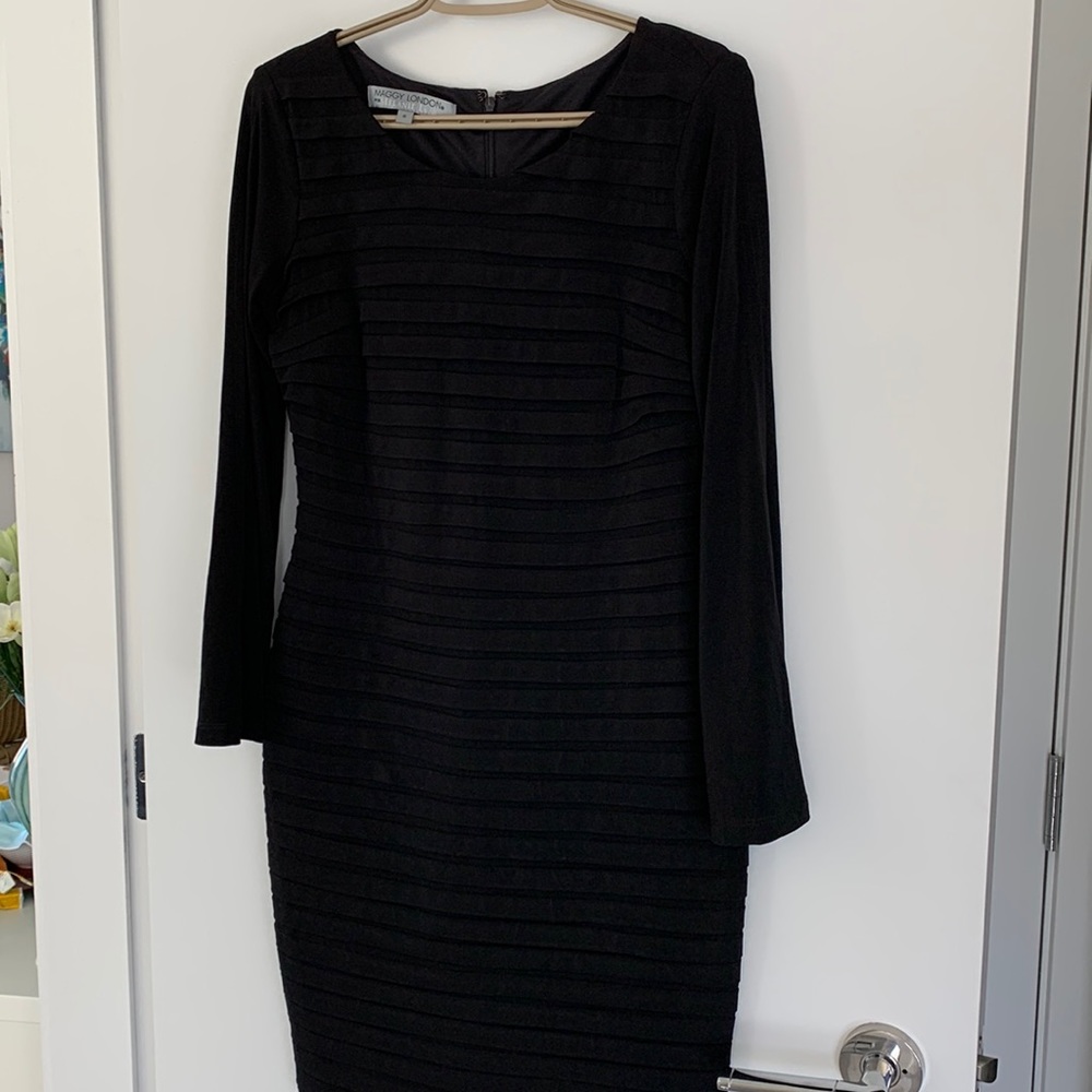 Dress for occasion, fitted, very comfortable, form hugging, black jersey, lined